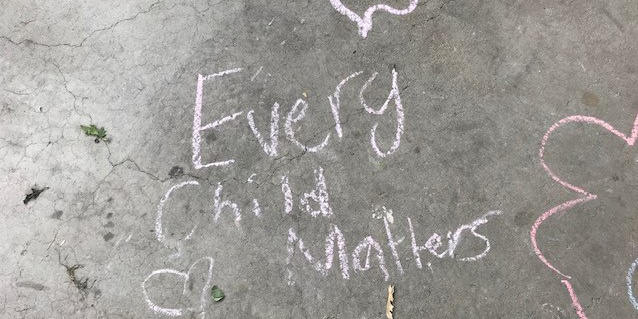 Every Child Matters written in chalk