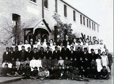 Regina Indian Residental School, students and school personnel, Saskatchewan, 1908. Photo:LAC PA-020921