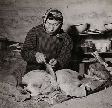 Inuit woman making kamiit (sealskin boots), 1946. Bud Glunz / National Film Board of Canada. Photothèque / Library and Archives Canada / e010966841