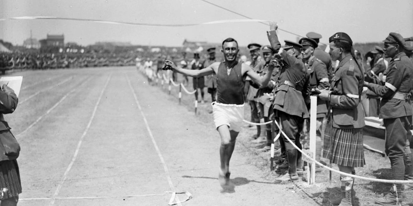 "Joe Keeper, Canadian Indian Runner, winning the three mile run. Canadian Sports. June, 1918" Canada. Dept. of National Defence/LAC PA-002734