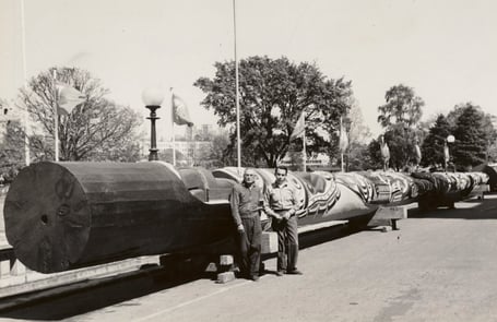 Chief Martin Mungo seen here with one of his carvers beside the giant totem awaiting shipment to the UK. e011307998