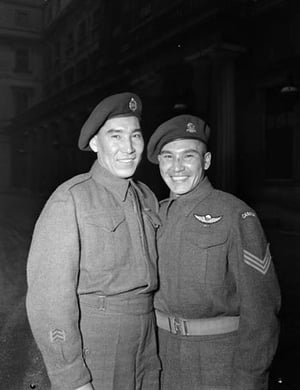 Sergeant Tommy Prince, 1st Cdn Parachute Battalion, with his brother, Private Morris Prince at an