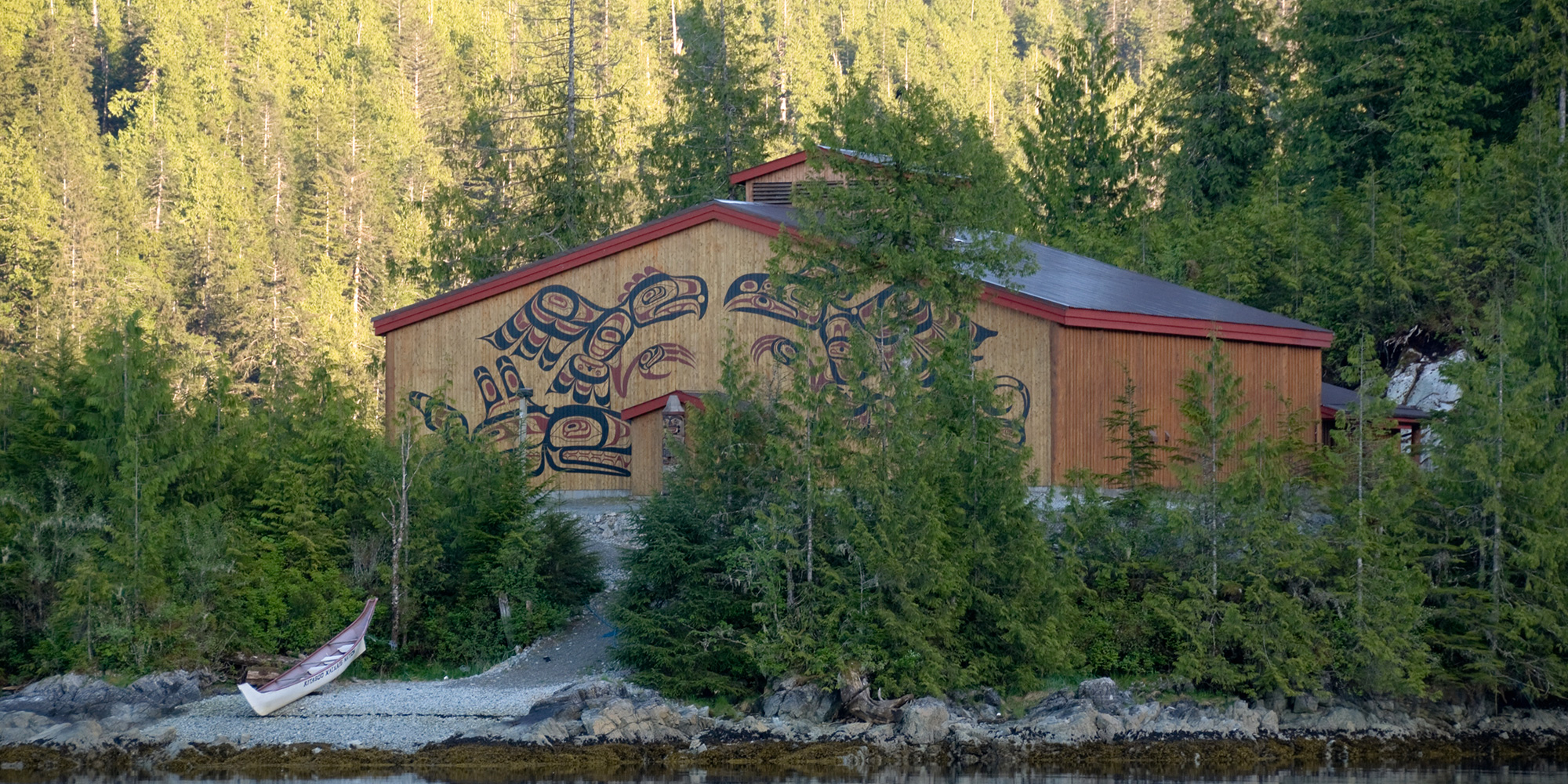 Bighouse and Ceremonial Canoe, Klemtu, BC. Photo: A.Davey, Flickr