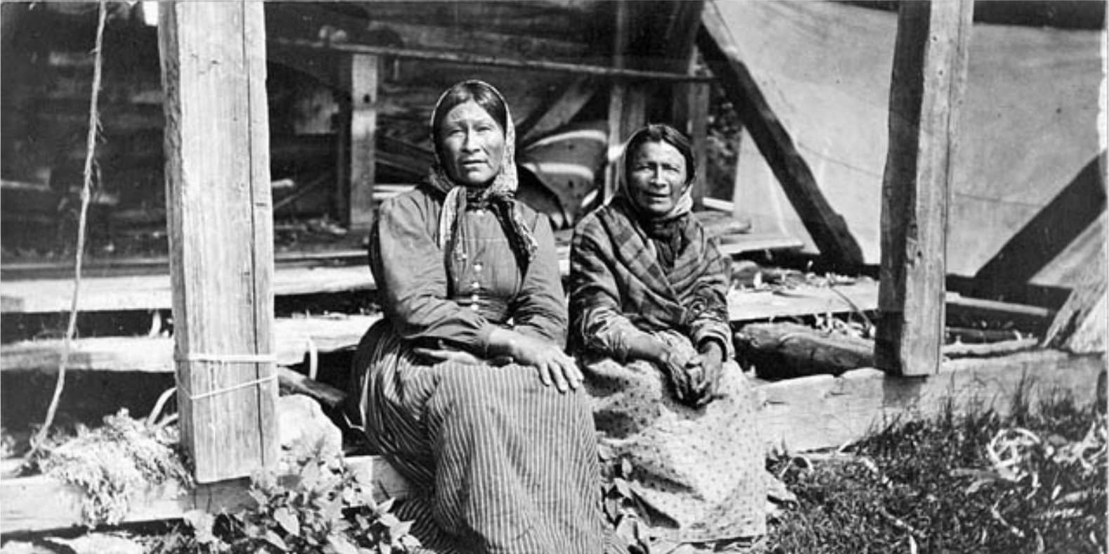 Two Ojibway women from Flying Post First Nation during Treaty 9 payment ceremony at New Brunswick House, Ontario, July 1906.
