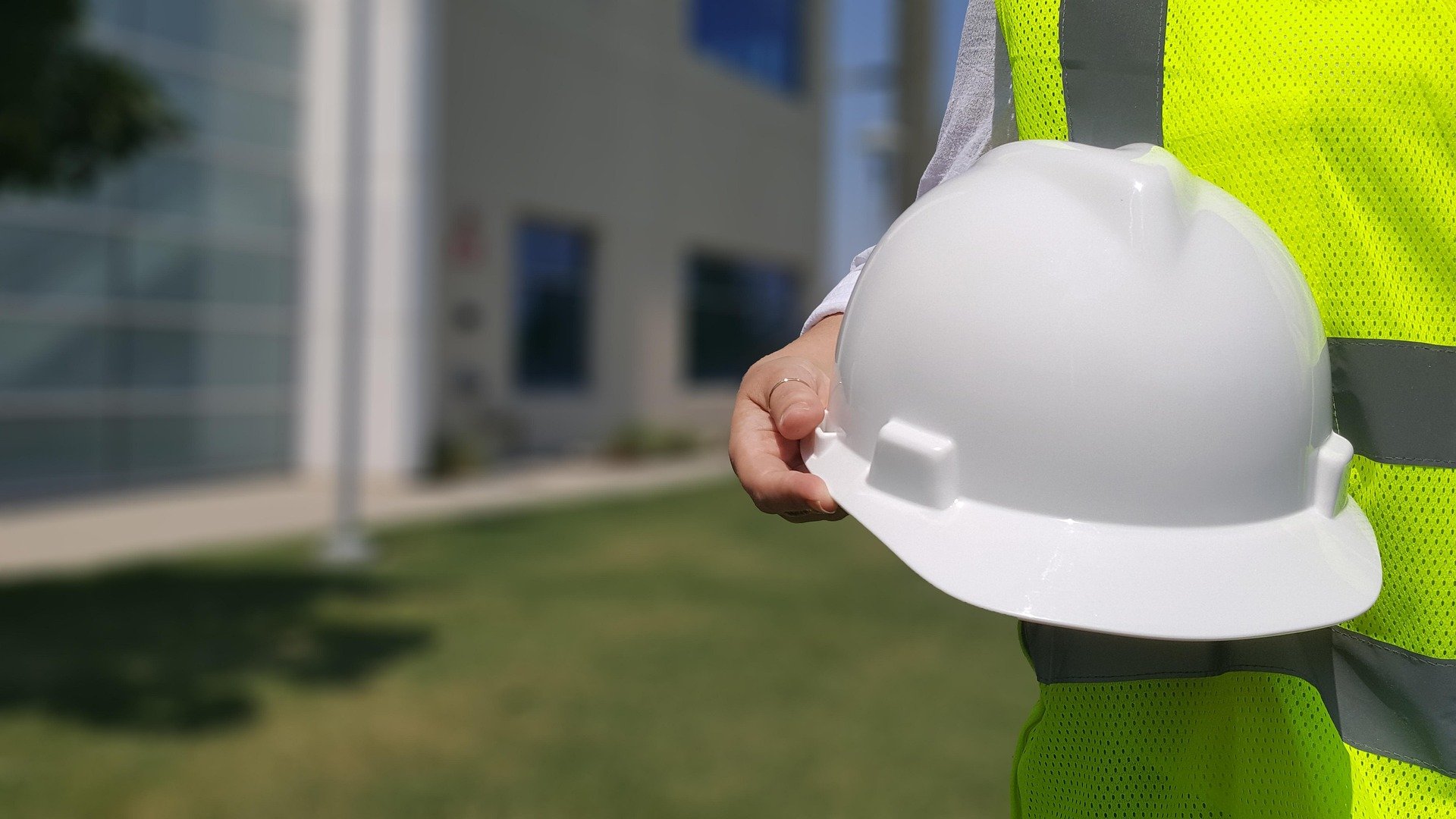 construction worker holding a hard hat