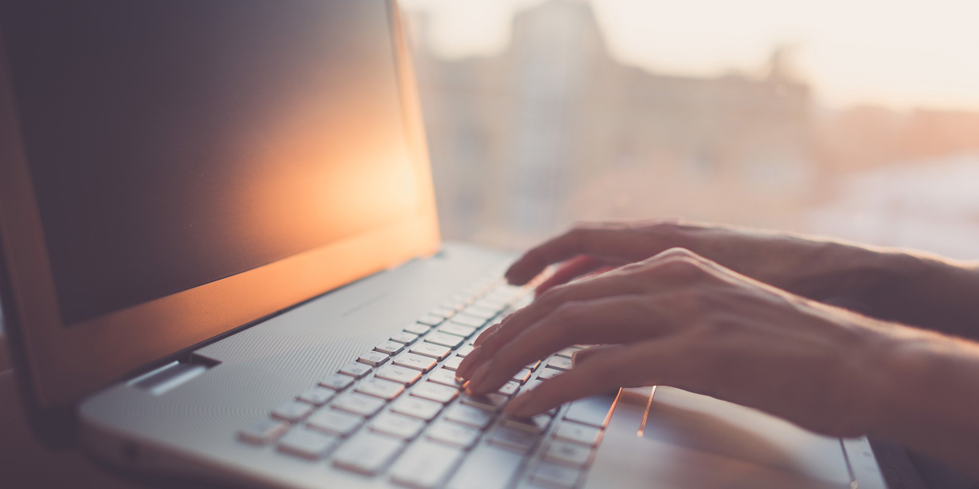 woman hands typing laptop