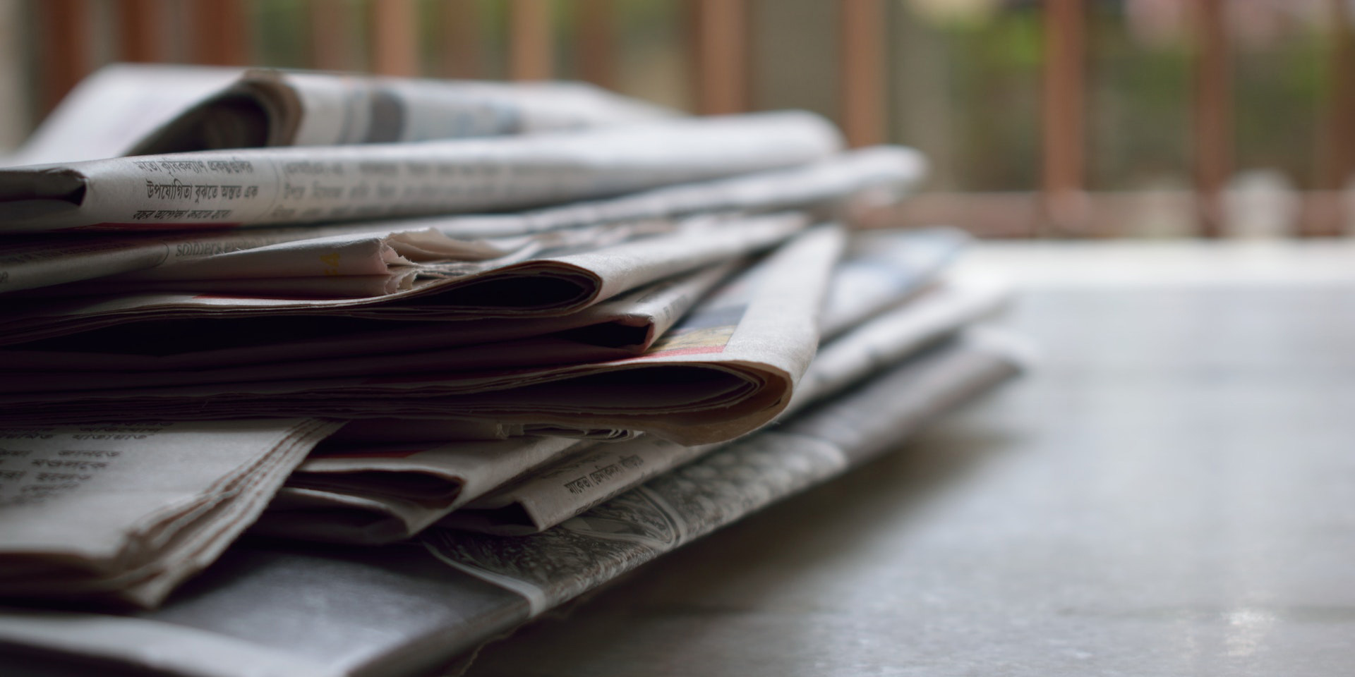 newspapers on a table