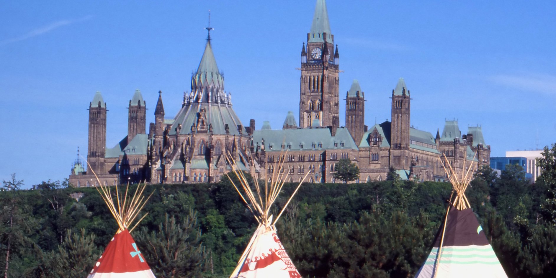 teepees in front of Parliament buildings